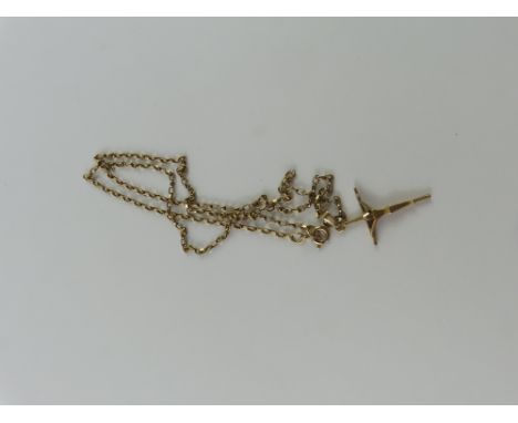 An unmarked crucifix pendant in the modernist style, on a filed belcher link chain, marked '375', 44cm long, 3.8g gross