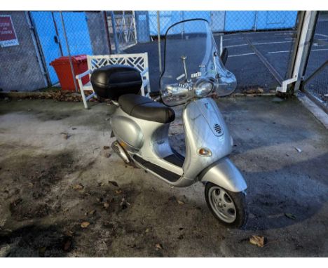 Piaggio Vespa ET4 scooter, 124cc petrol engine, silver, registration LG52 VTO, registered November 2002, V5C, keys, paperwork