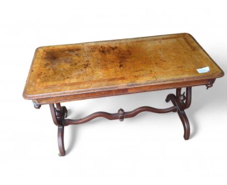 A 19th century veneered console table with marquetry on top surface. A baluster support on each side descends to two respecti