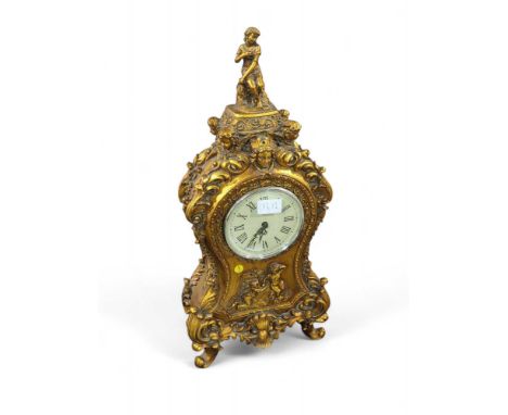 A decorative mantel clock in Louis XV style gilt wood case, 57cms high