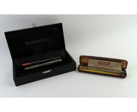 A modern Yard O Led silver 'Standard' fountain pen, cased; together with an earlier example also cased