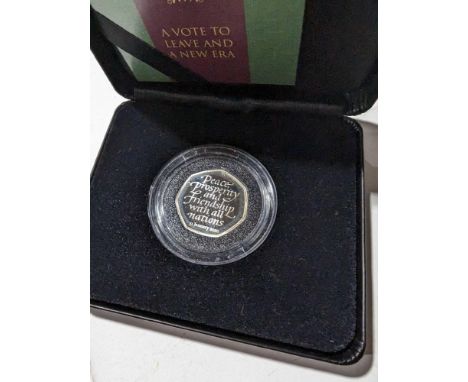 The Royal Mint A New Era silver proof 50p in case with certificates together with another together with Pobjoy Mint VE Day 20