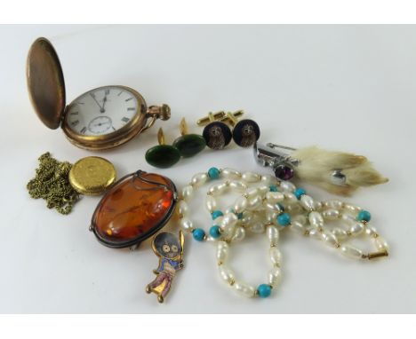 An Elgin gold plated pocket watch, a rabbit's foot brooch, a necklace with a clasp marked '9ct', a Robinson's brooch and vari