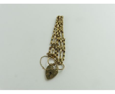 A 9ct gold three bar gate bracelet, 7.47g gross