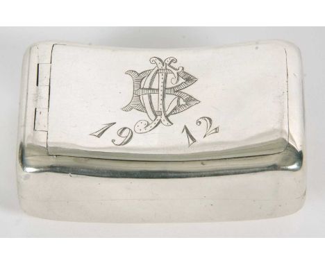 An Edwardian silver "squeeze" snuff box of slight curved rectangular form, lid engraved with initials and dated 1912, having 