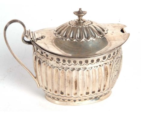 George III silver mustard and liner of oval form, reeded handle and rim, having a hinged dome lid and a part fluted with cent