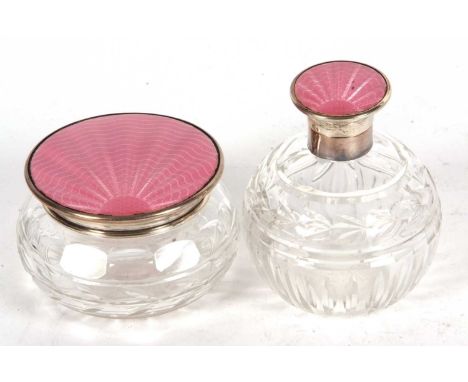 An Art Deco glass dressing table scent and powder bowl, each with pink enamel guilloche decoration in a sunray design, hallma