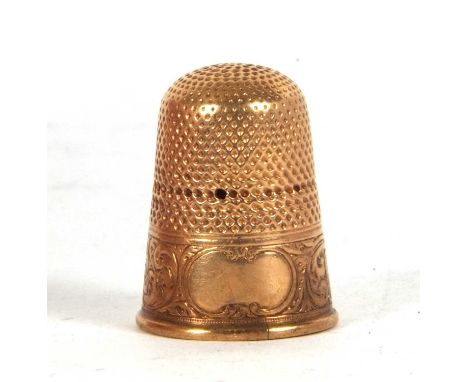 A vintage yellow metal thimble (a/f) tests for 9ct gold, 5.1 grms