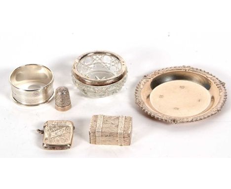 Mixed Lot: A small silver dish, Birmingham 1972, makers mark for A T Callon Ltd, 9.5cm diameter, a modern white metal pill bo