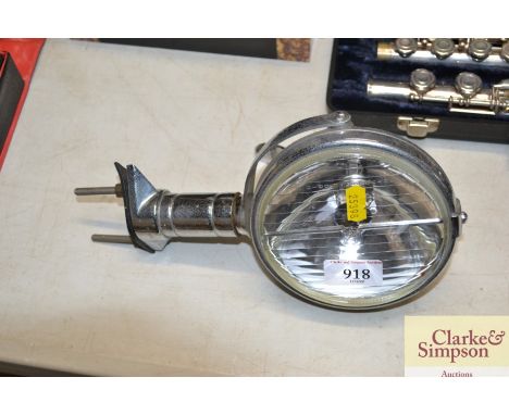 A chrome and glass spot light
