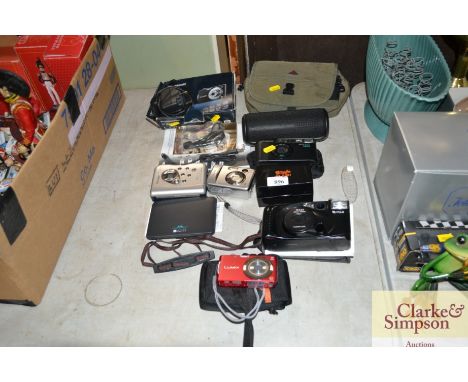 A quantity of cameras, portable speaker etc.