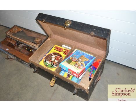 A storage trunk and contents of various games and puzzles