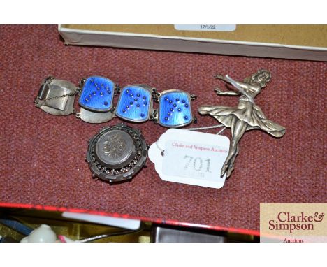 A standard silver brooch; a silver brooch in the form of a ballet dancer marked D &amp; S; and a KAR Norwegian silver and ena