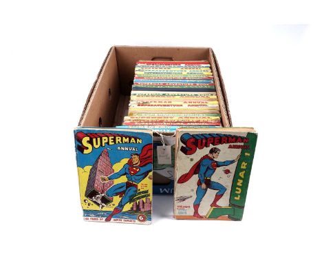 A collection of British superhero re-print annuals, comprising: Superman Annual, Superboy Annual, and Superadventure Annual, 