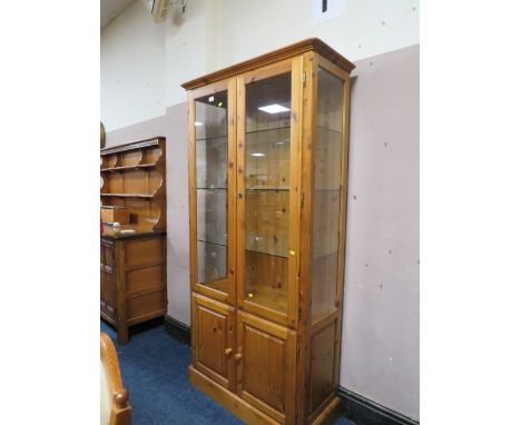 A DUCAL PINE GLAZED DISPLAY CABINET H- 188 CM W-93 CM