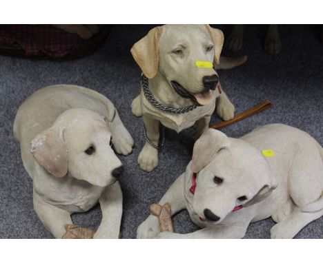A SELECTION OF RESIN AND CERAMIC DOG FIGURES 