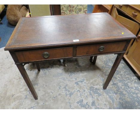 A VINTAGE MAHOGANY TWO DRAWER SIDE TABLE WITH LEATHER TOP