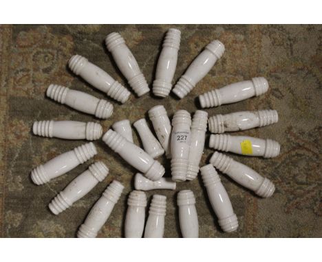 A COLLECTION OF VINTAGE CERAMIC CORD PULL HANDLES 