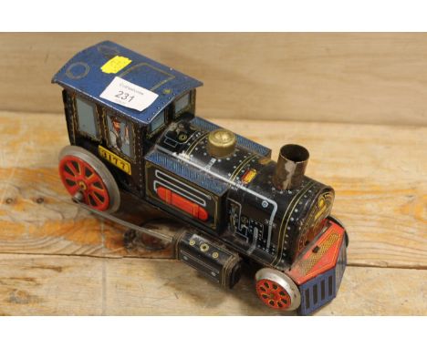 A VINTAGE TIN PLATE STEAM ENGINE