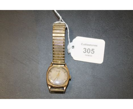 A HALLMARKED 9CT GOLD ROTARY WRIST WATCH ON EXPANDABLE STEEL BRACELET 