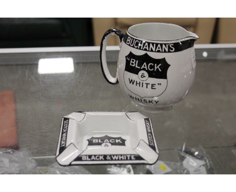 A VINTAGE BLACK AND WHITE WHISKY SHIELD JUG AND MATCHING ASHTRAY