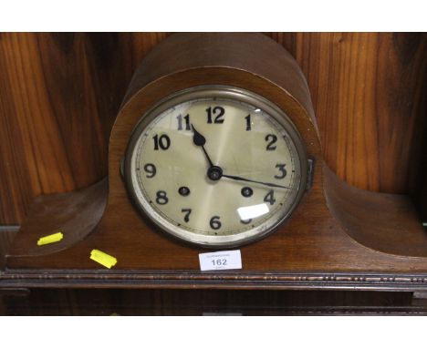 A VINTAGE OAK NAPOLEON MANTLE CLOCK