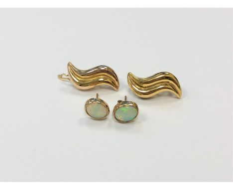 A pair of 9ct gold earrings, 6.6g, together with a pair of opal earrings in yellow gold, 1.6g.  CONDITION REPORT: Opal earrin