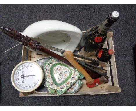 A basket of cast iron trivets, Booths Perfection bed pan, vintage Weigh Master scales, Moet 1943 magnum champagne bottle, han