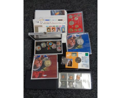A tray of first day covers, commemorative coins, etc 