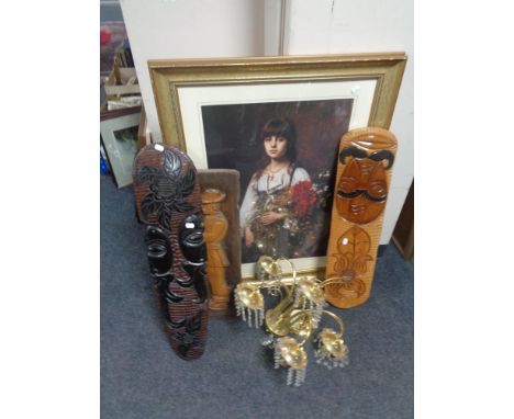 A gilt framed print of a girl with flowers, three carved wooden panels, brass five way light fitting with glass drops 
