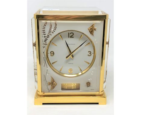 A Jaeger LeCoultre Marina Atmos Clock, Model 'Fond Opal Poisson' (Fish Opal Background), gilt brass case glazed with opaque p