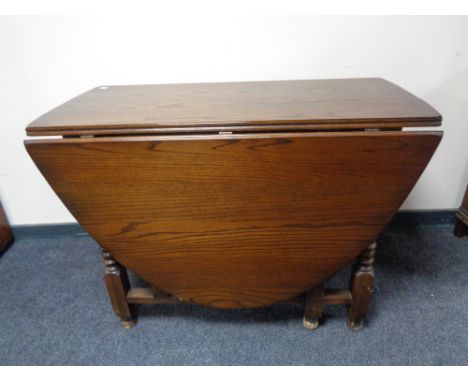 A 20th century oak gate leg table 