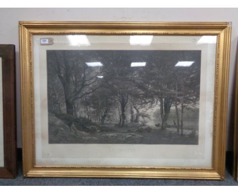 An early twentieth century monochrome print depicting a a boat by a forest 