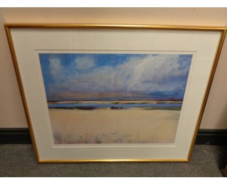 A gilt framed signed limited edition print of an estuary, indistinctly signed 