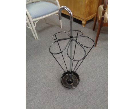 A 20th century ceramic and metal umbrella stand in the form of an umbrella 