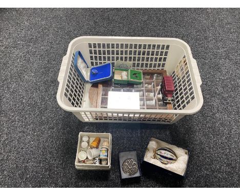 A basket of thimble case and thimbles, ceramic egg, brooch etc 