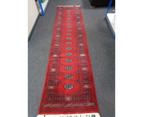 A Tekke runner, 320cm by 78cm