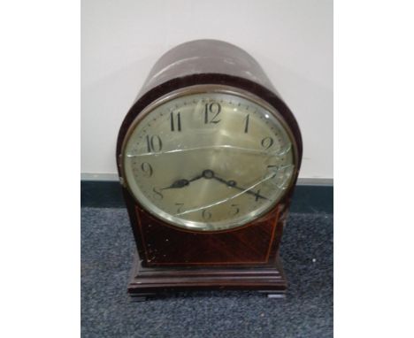 An Edwardian inlaid mahogany dome topped bracket clock with silvered dial (a/f)