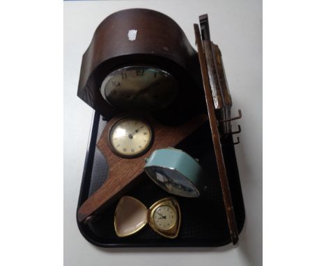 A tray of 1930's oak cased mantel clock, clock, Hero alarm clock, gent's travel clock, barometer on a board 