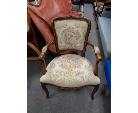 A French style salon armchair upholstered in a tapestry fabric 