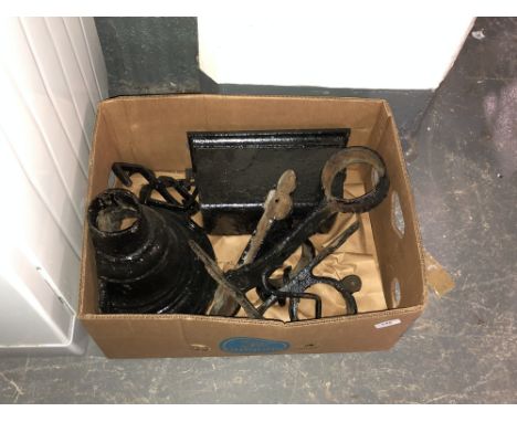 A box of cast iron drain hopper, brackets and salvaged parts 