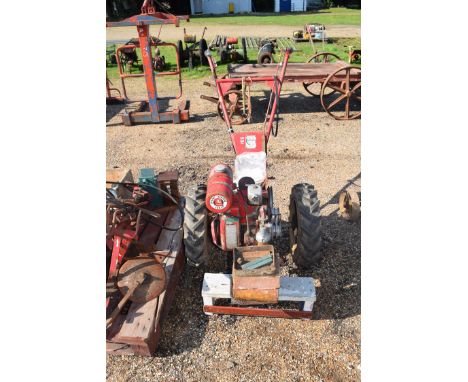 A Barford Atom 30 "The original multi-purpose two-wheeled tractor" to include various attachments, plough, cultivator etc, wi