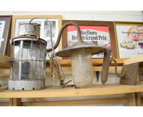 Vintage oil lamp along with another swan-necked external light fitting