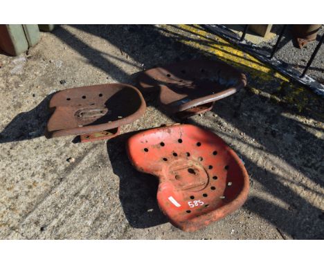Three tractor seats