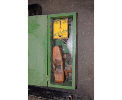Wooden toolbox containing various planes