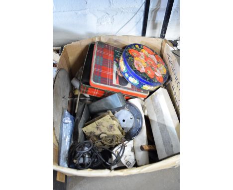 Box containing clock movements and spares
