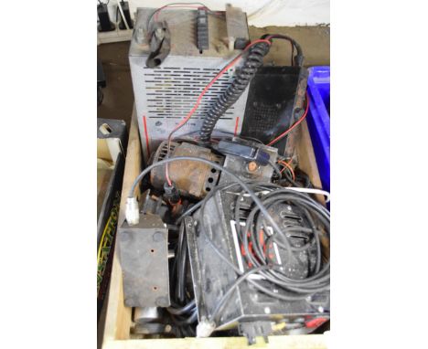 Box containing vintage testing equipment