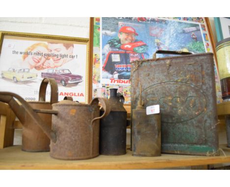 Quantity of vintage oil cans including one marked Esso