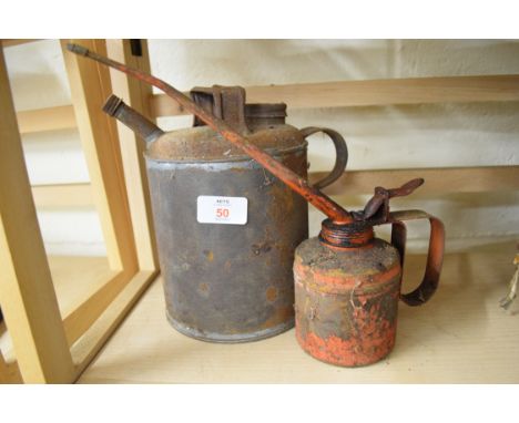 Two vintage oil cans