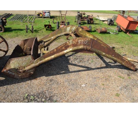Front loading bucket for a tractor